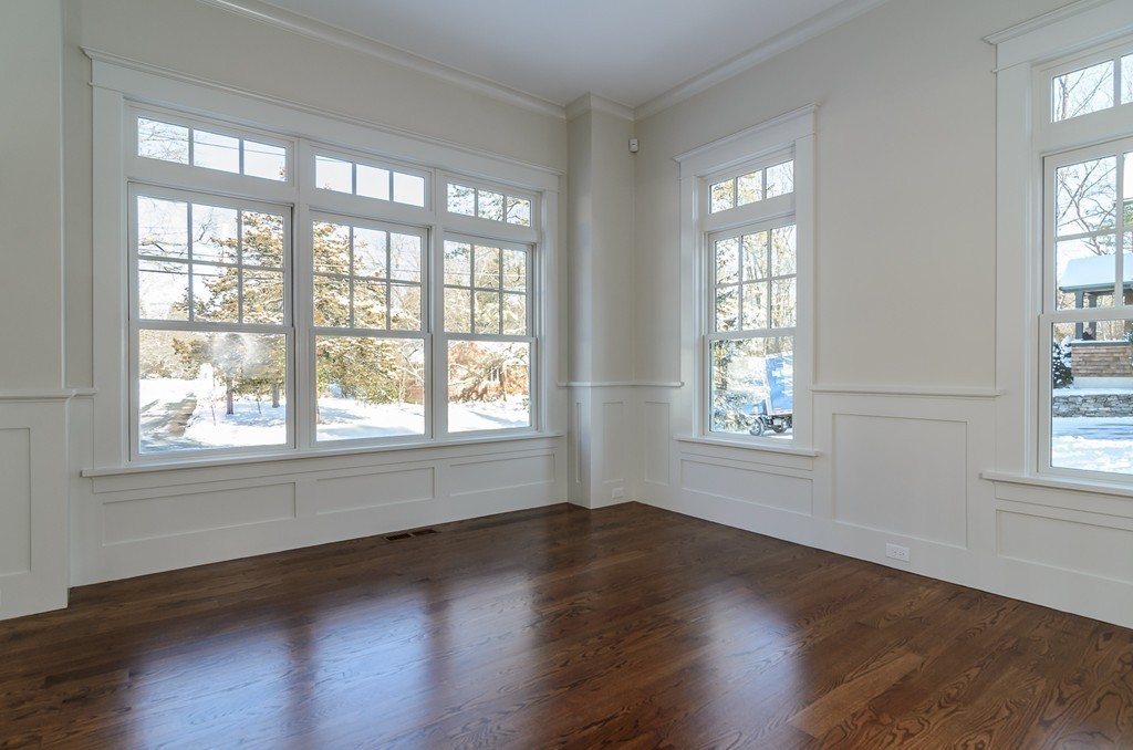 27 Priscilla Road Wellesley, MA 02481 - Photo 9 of 17 a view of an empty room with wooden floor and a window