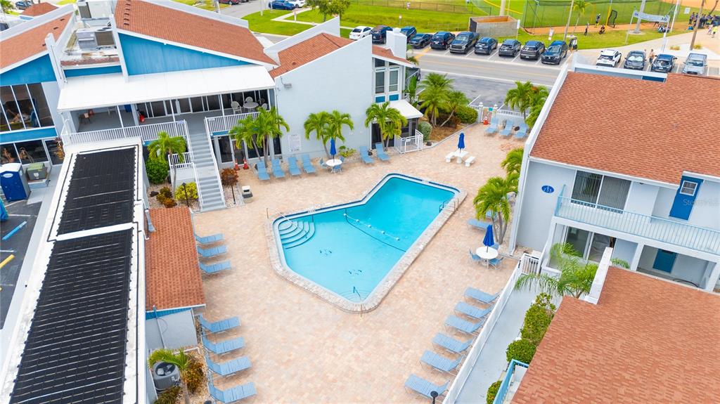230 Medallion Boulevard, Unit E Madeira Beach, FL 33708 - Photo 22 of 35 an aerial view of a house