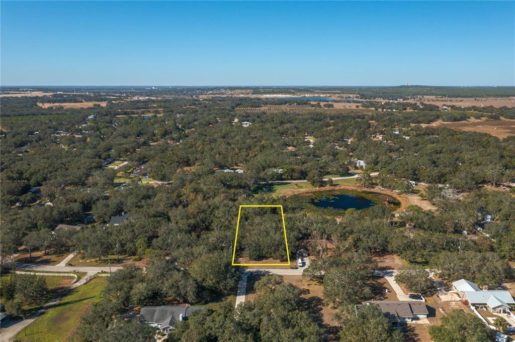 Capps Rd Lake Lake Wales, FL 33898 - Photo 1 of 1 an aerial view of residential building and green space