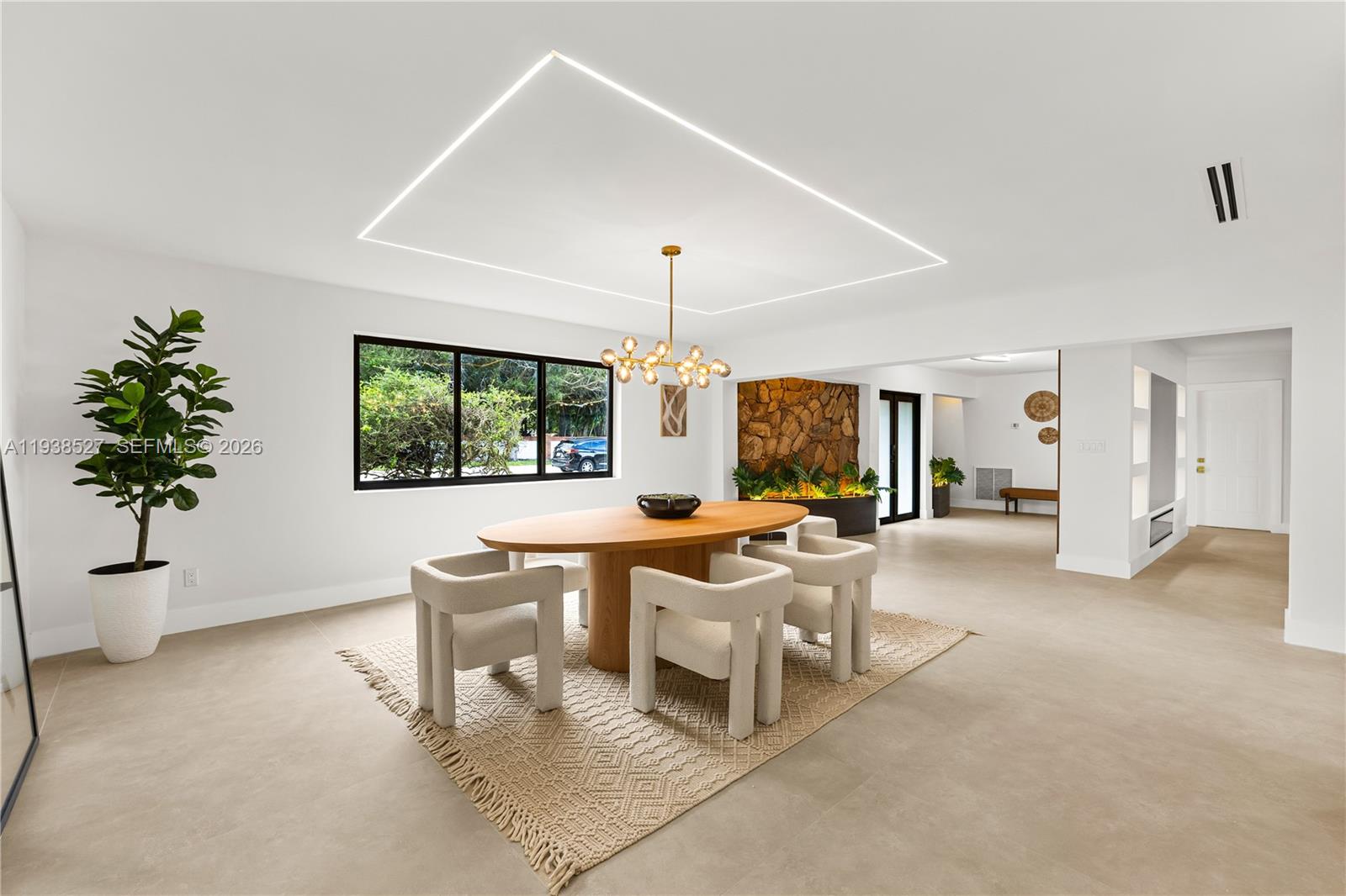 10415 Southwest 87th Avenue Miami, FL 33156 - Photo 20 of 53 a living room with furniture a window and a potted plant