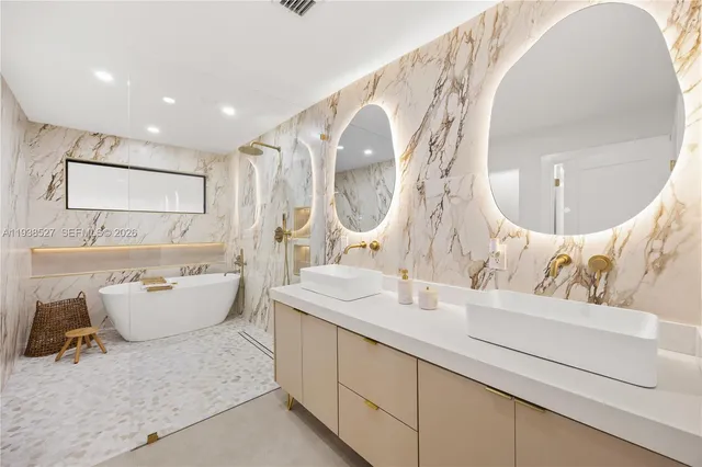 a bathroom with a double vanity sink and a mirror