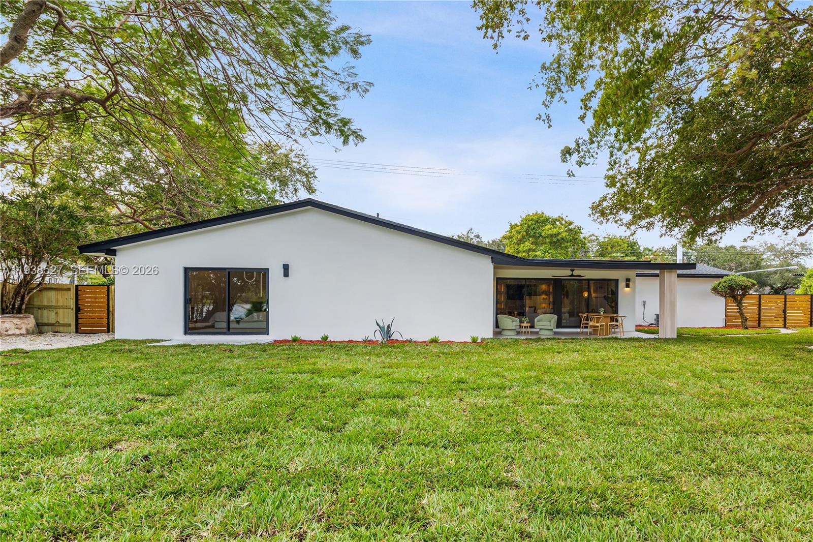 10415 Southwest 87th Avenue Miami, FL 33156 - Photo 37 of 53 a house view with a garden space