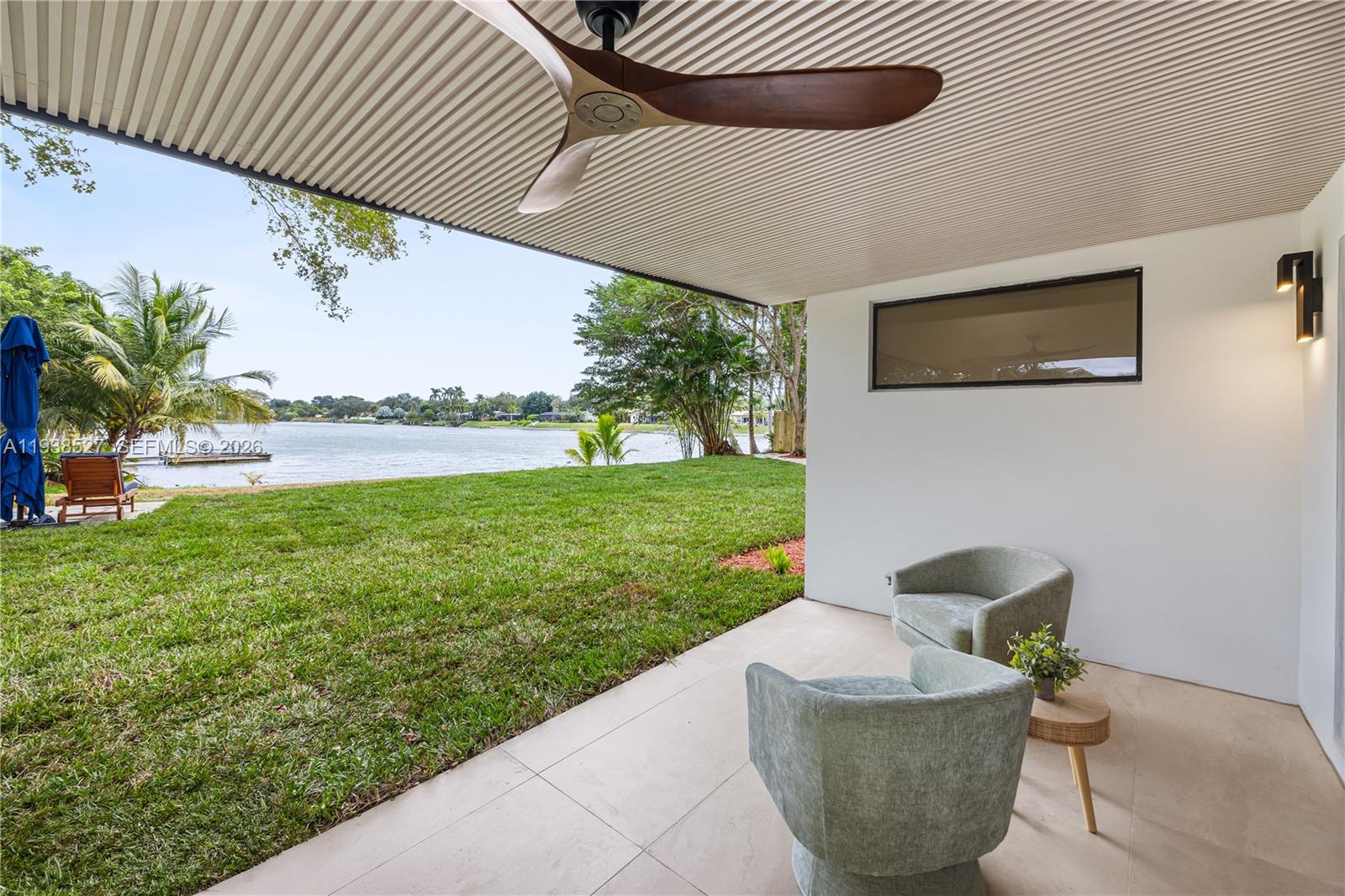 10415 Southwest 87th Avenue Miami, FL 33156 - Photo 38 of 53 a front view of a house with garden
