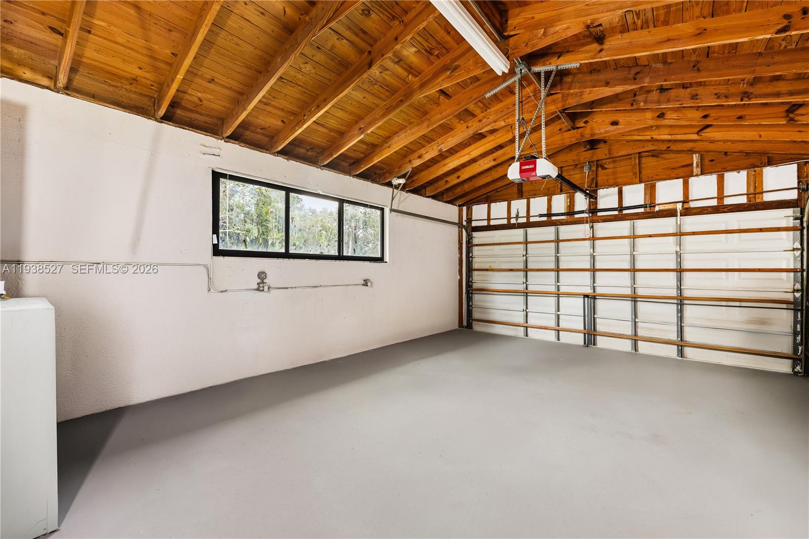 10415 Southwest 87th Avenue Miami, FL 33156 - Photo 40 of 53 a view of a room with racks on the wall