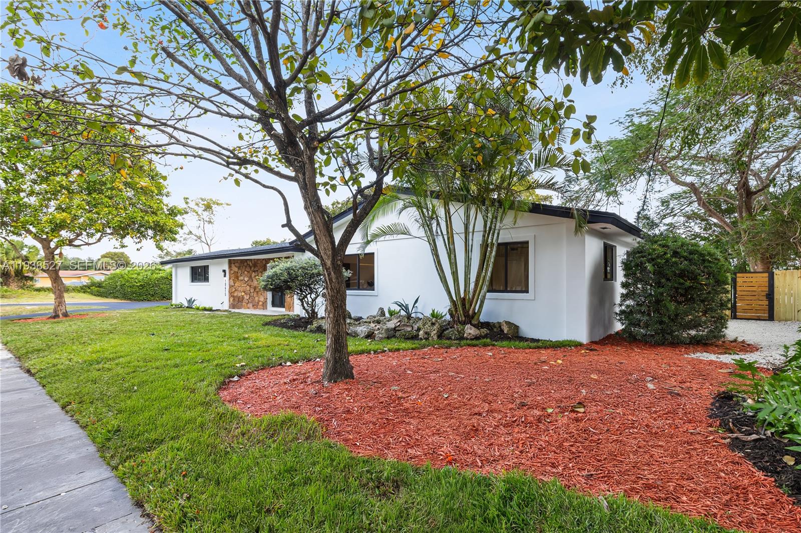 10415 Southwest 87th Avenue Miami, FL 33156 - Photo 41 of 53 a view of a house with yard and a tree