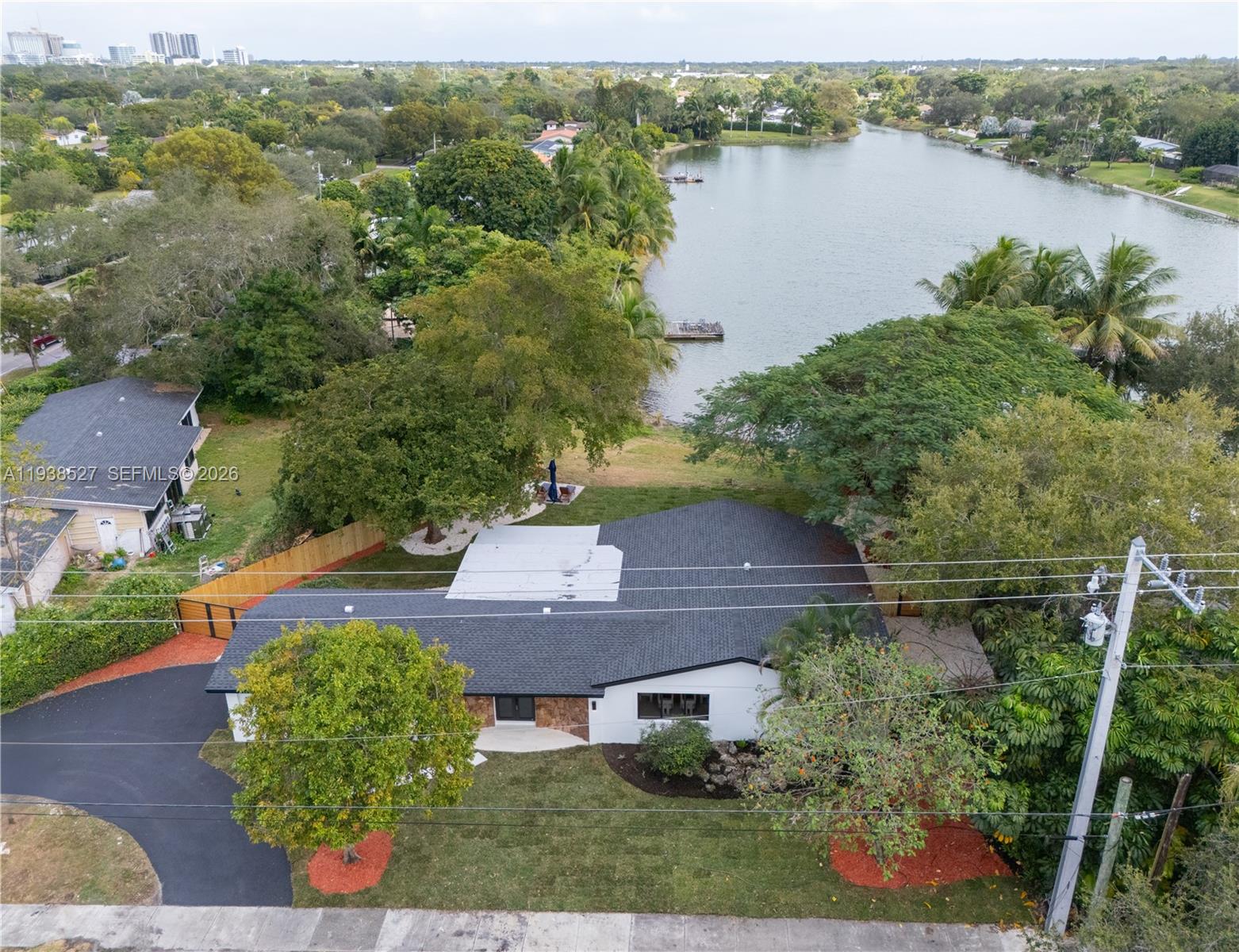 10415 Southwest 87th Avenue Miami, FL 33156 - Photo 44 of 53 an aerial view of a house with outdoor space and lake view