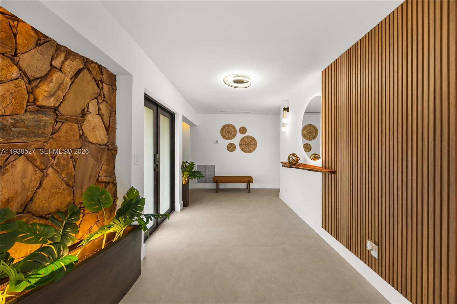 10415 Southwest 87th Avenue Miami, FL 33156 - Photo 7 of 53 a view of an empty room with a window