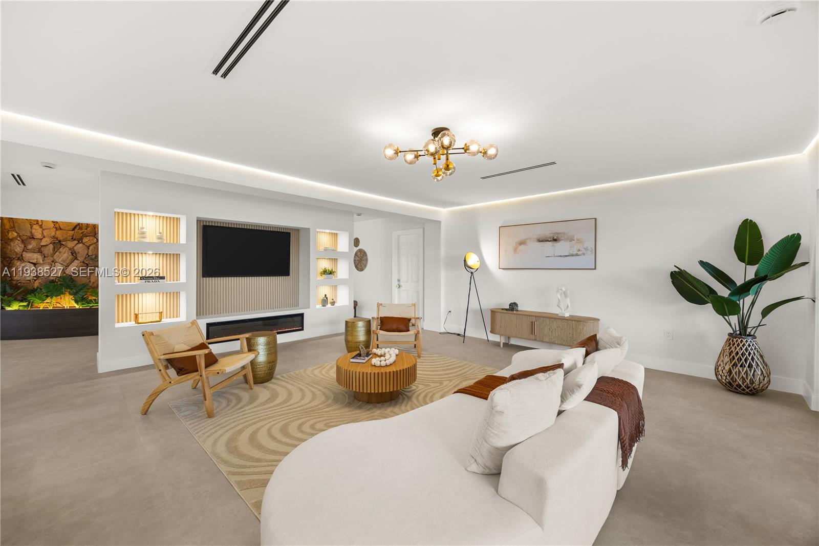 10415 Southwest 87th Avenue Miami, FL 33156 - Photo 10 of 53 a living room with furniture potted plant and a window