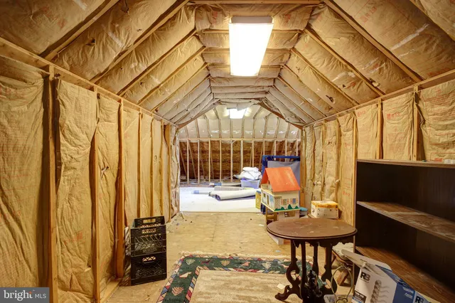 a view of a living room and bathroom
