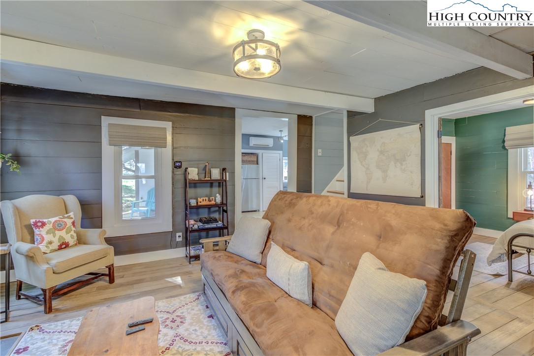 148 Fox Hill Road Vilas, NC 28692 - Photo 12 of 25 a living room with furniture and wooden floor