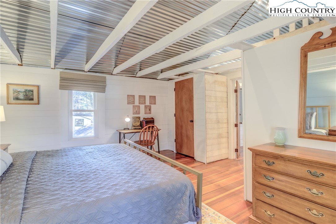 148 Fox Hill Road Vilas, NC 28692 - Photo 20 of 25 a bedroom with a bed and a dresser