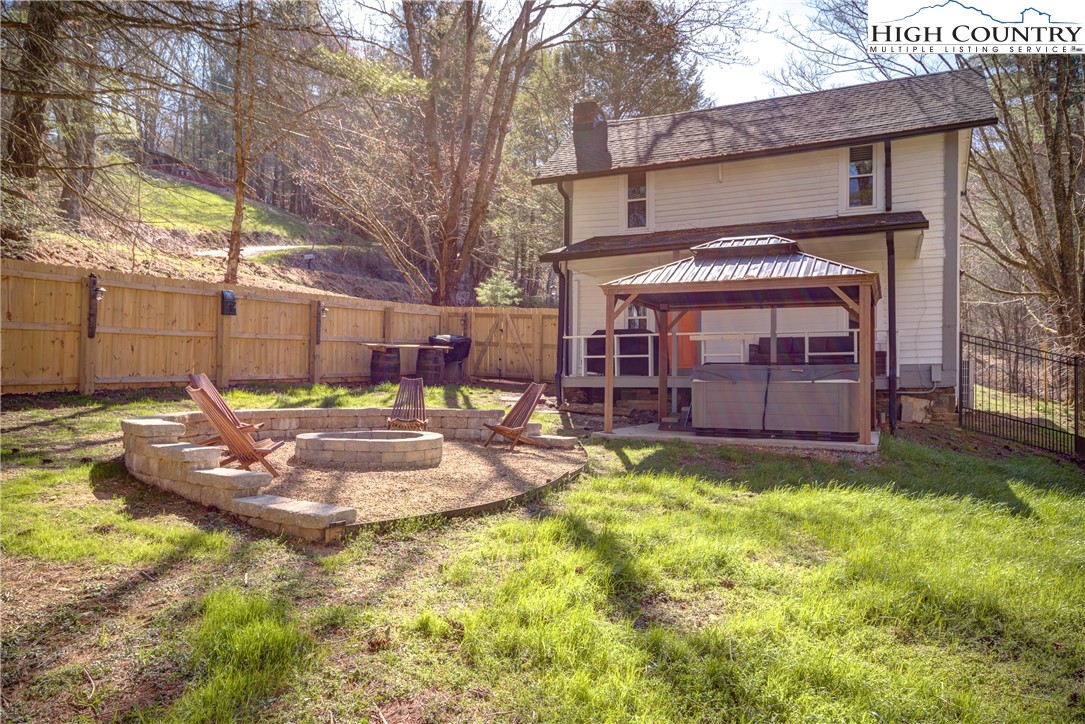 148 Fox Hill Road Vilas, NC 28692 - Photo 2 of 25 a view of a house with swimming pool