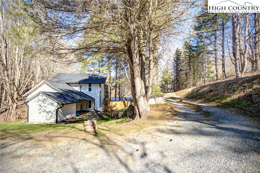 148 Fox Hill Road Vilas, NC 28692 - Photo 23 of 25 a view of a yard with a tree