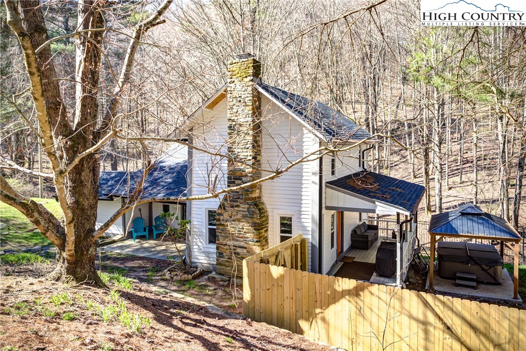 148 Fox Hill Road Vilas, NC 28692 - Photo 5 of 25 a view of a house with a yard covered in snow