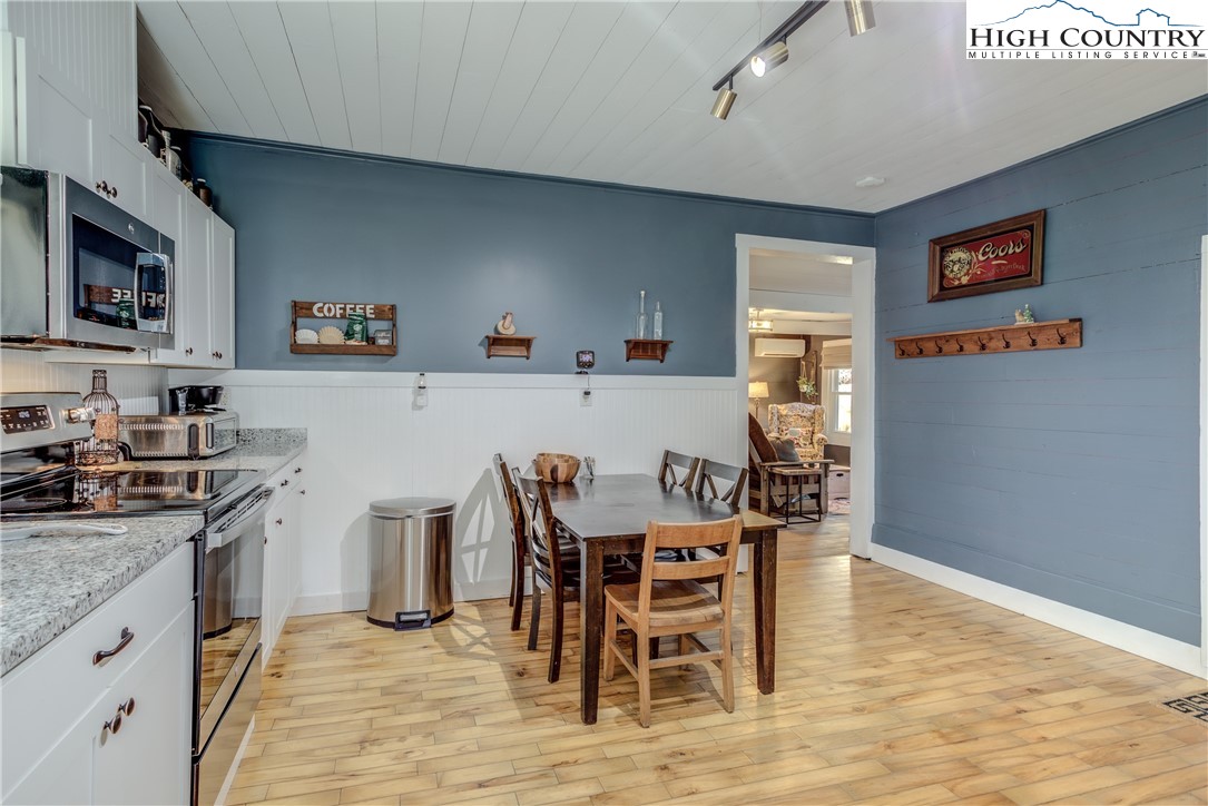 148 Fox Hill Road Vilas, NC 28692 - Photo 7 of 25 a view of kitchen with cabinets and wooden floor