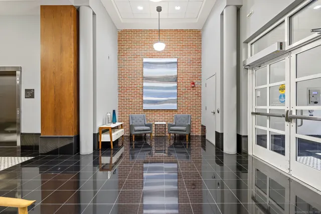 a dining room with a table and chairs