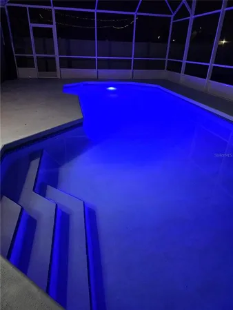 a view of water heater room with empty racks