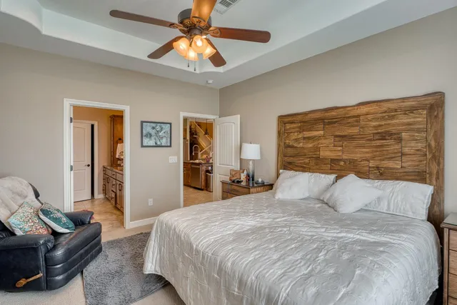 a bedroom with a bed and furniture