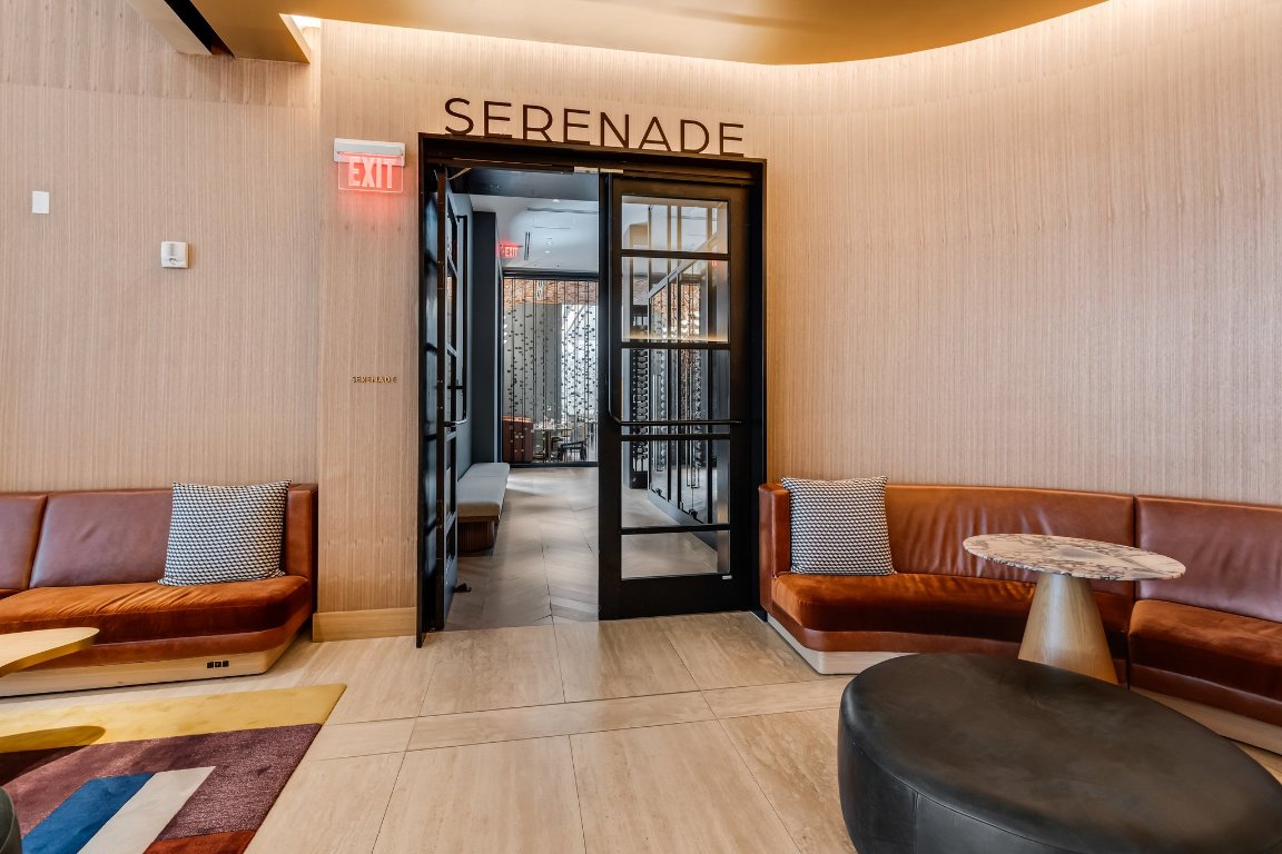210 Lavaca Street, Unit 2308 Austin, TX 78701 - Photo 30 of 37 Entrance to Serenade American Brasserie located on ground floor.