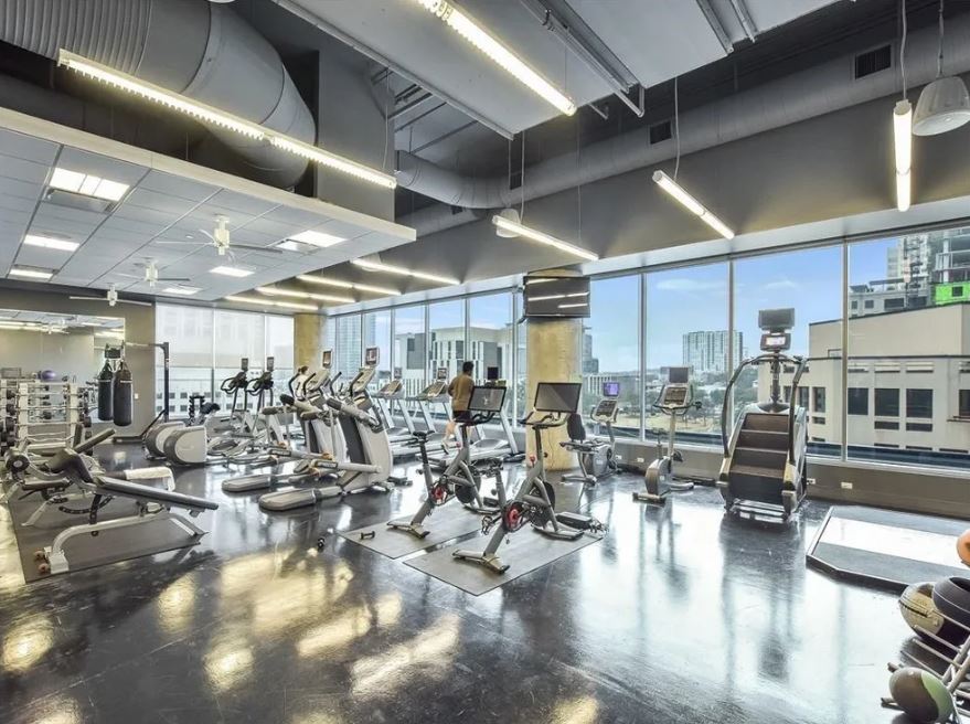 210 Lavaca Street, Unit 2308 Austin, TX 78701 - Photo 34 of 40 a view of a room with lots of gym equipment