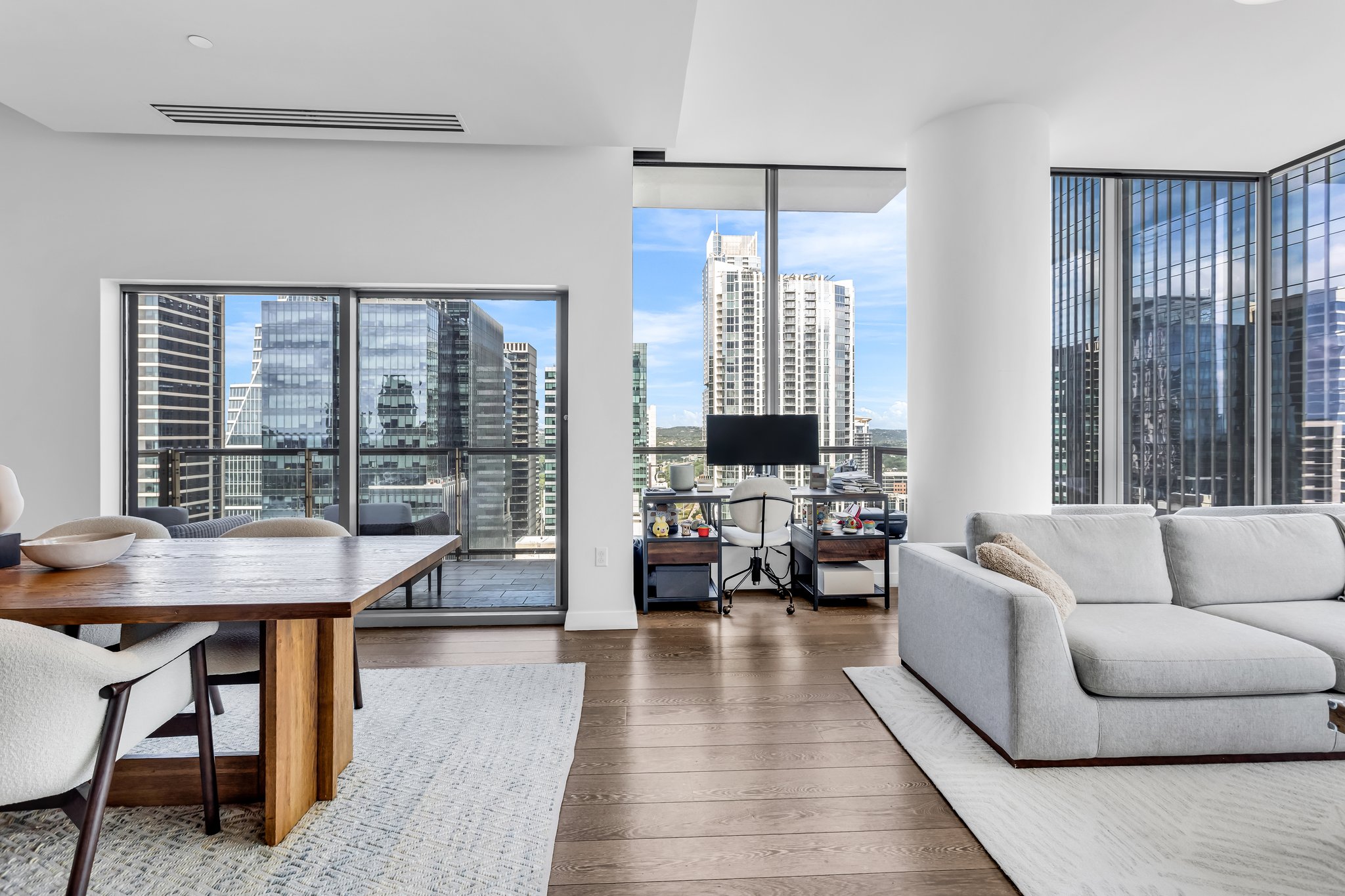 210 Lavaca Street, Unit 2308 Austin, TX 78701 - Photo 5 of 40 a living room with furniture and a large window