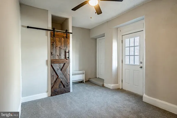an empty room with windows