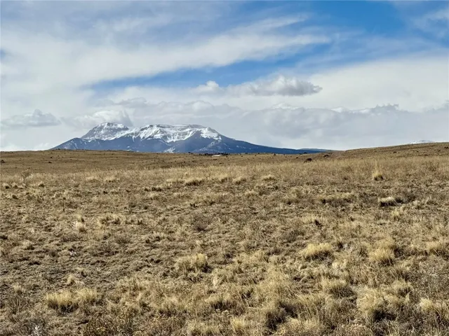 a view of an ocean and mountain