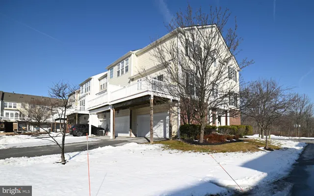 a front view of a building with street view