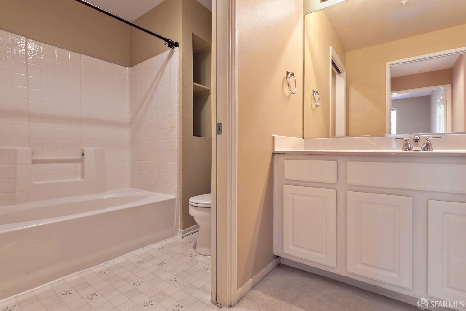 320 Caldecott Lane, Unit 331 Oakland, CA 94618 - Photo 8 of 14 a bathroom with a bathtub and a sink