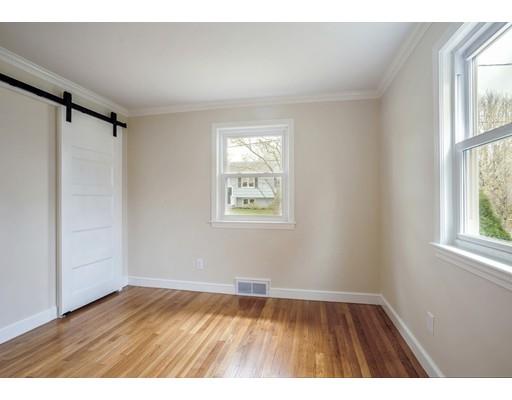 14 Leonard Street Hingham, MA 02043 - Photo 11 of 15 an empty room with wooden floor and windows
