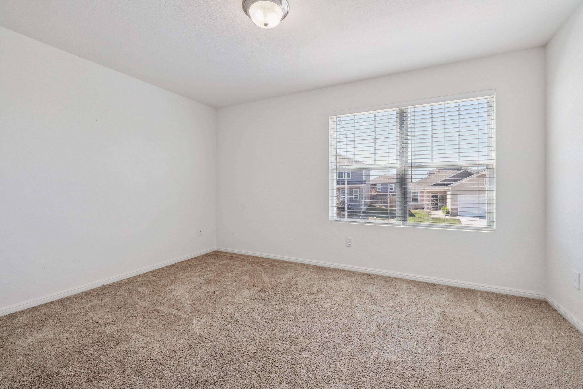 14105 Jeannette Rankin Rd Manor Manor, TX 78653 - Photo 24 of 29 Second bedroom