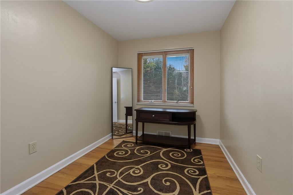 690 Pearce Mill Road Wexford, PA 15090 - Photo 13 of 38 a room with chair and a window
