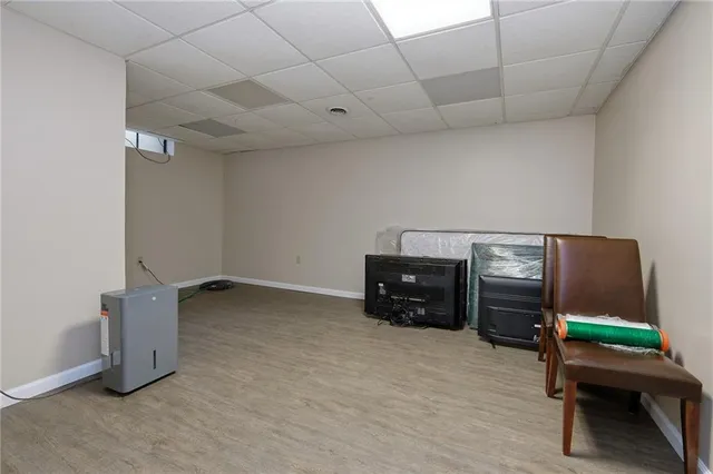 a room with furniture and a flat screen tv