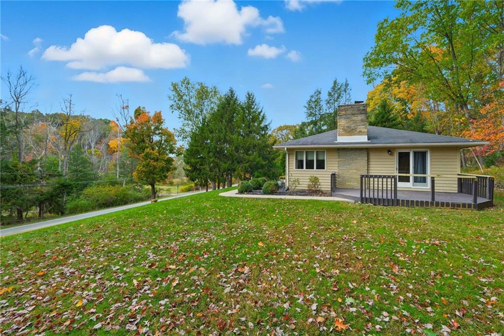 690 Pearce Mill Road Wexford, PA 15090 - Photo 31 of 38 a view of a house with a backyard