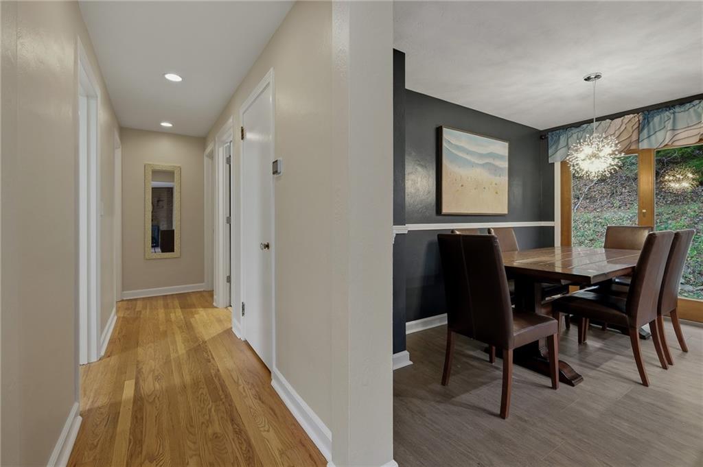 690 Pearce Mill Road Wexford, PA 15090 - Photo 6 of 38 a view of a dining room with furniture and wooden floor