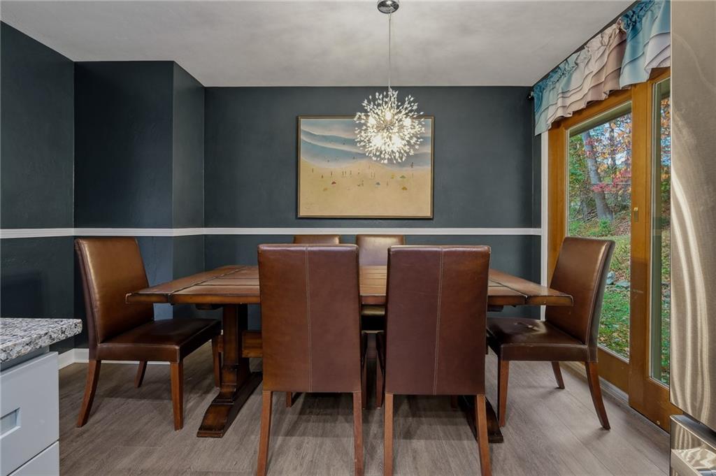 690 Pearce Mill Road Wexford, PA 15090 - Photo 7 of 38 a view of a dining room with furniture window and outside view