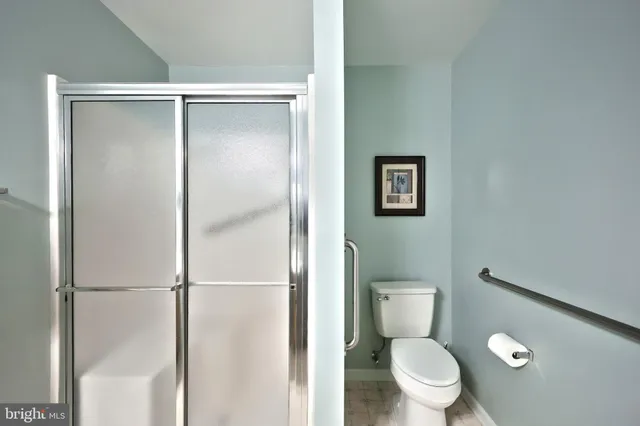 a bedroom with a bed furniture and a window