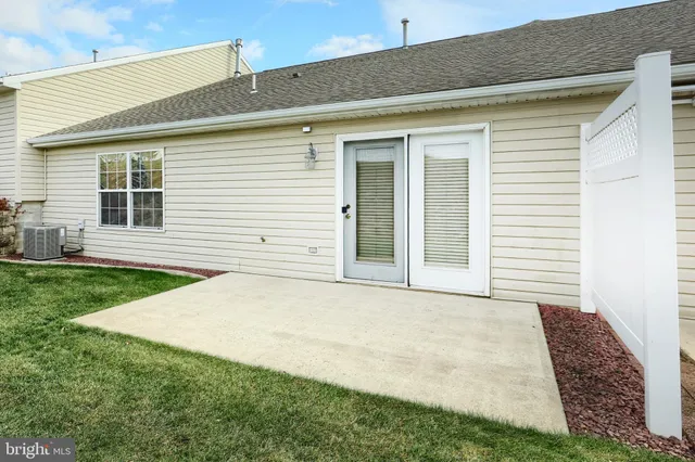 a view of a yard with an ocean view