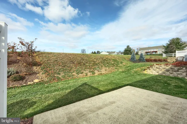 an aerial view of a house with a garden