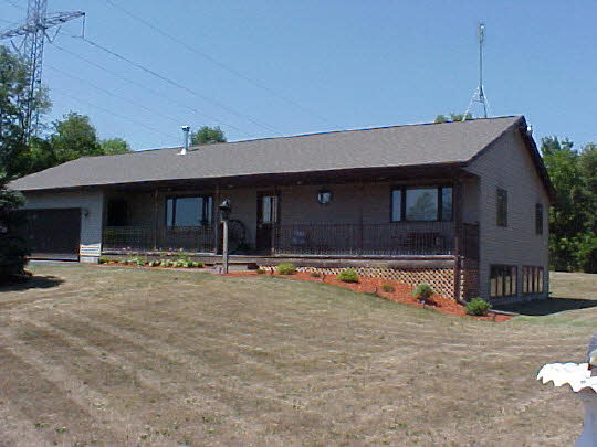 3930 North Marrill Road Byron, IL 61010 - Photo 1 of 6 a view of a house with swimming pool and porch