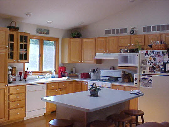 3930 North Marrill Road Byron, IL 61010 - Photo 3 of 6 a kitchen with a sink cabinets and window