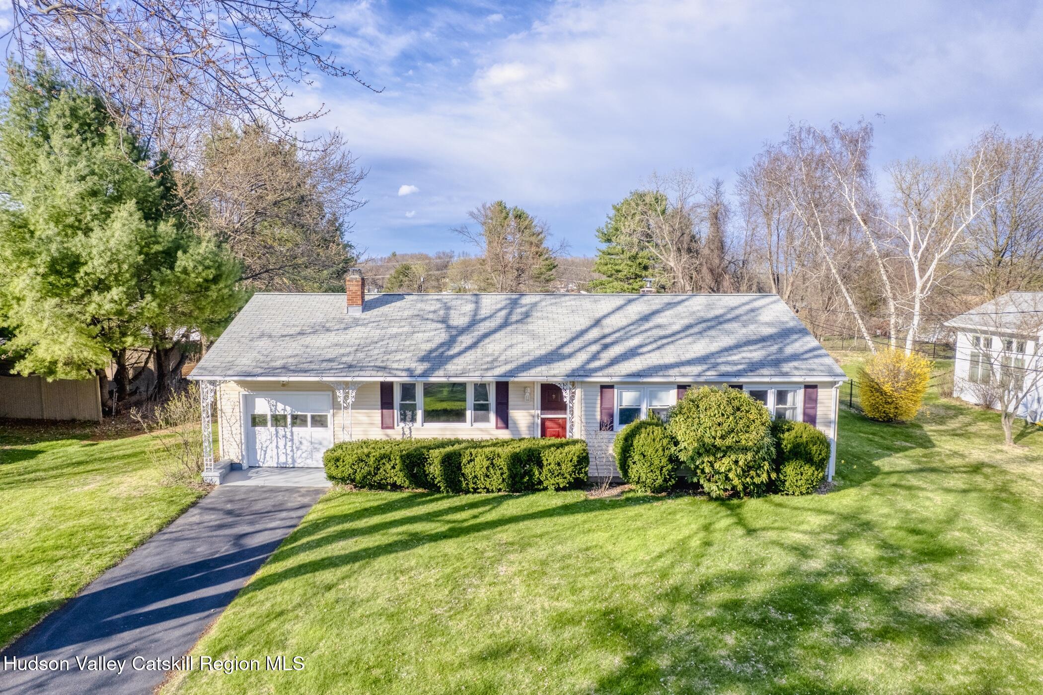 121 Rayna Street Hurley, NY 12443 - Photo 1 of 41 a view of a house with a big yard plants and large trees