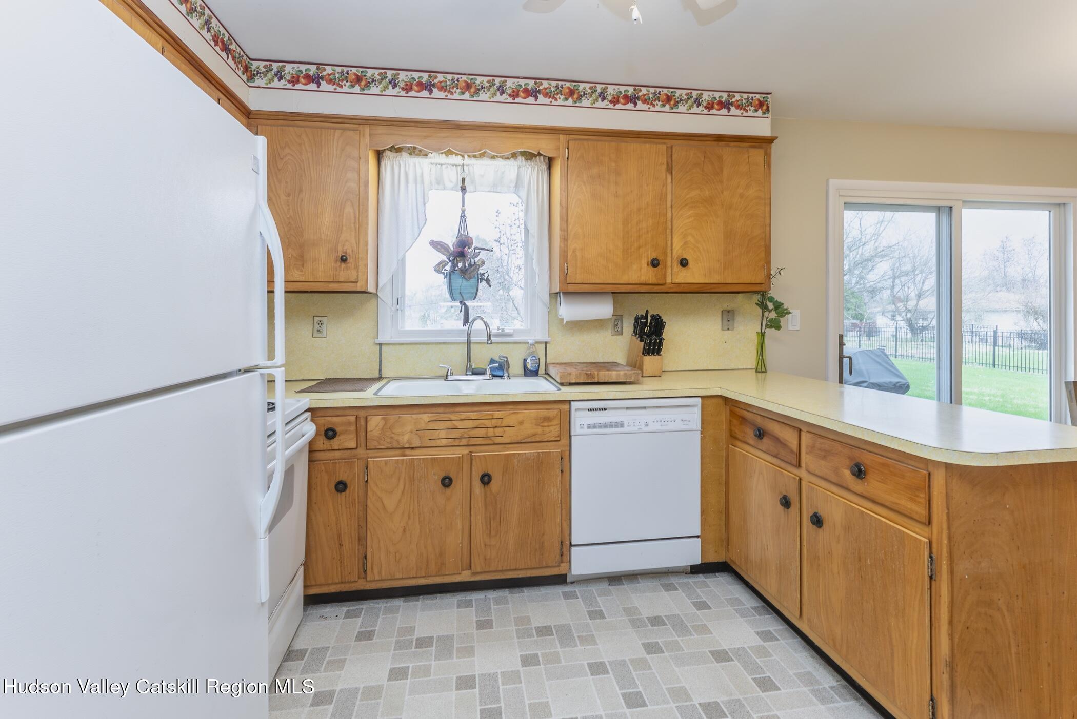 121 Rayna Street Hurley, NY 12443 - Photo 18 of 41 a spacious bathroom with a double vanity sink a mirror and a bathtub