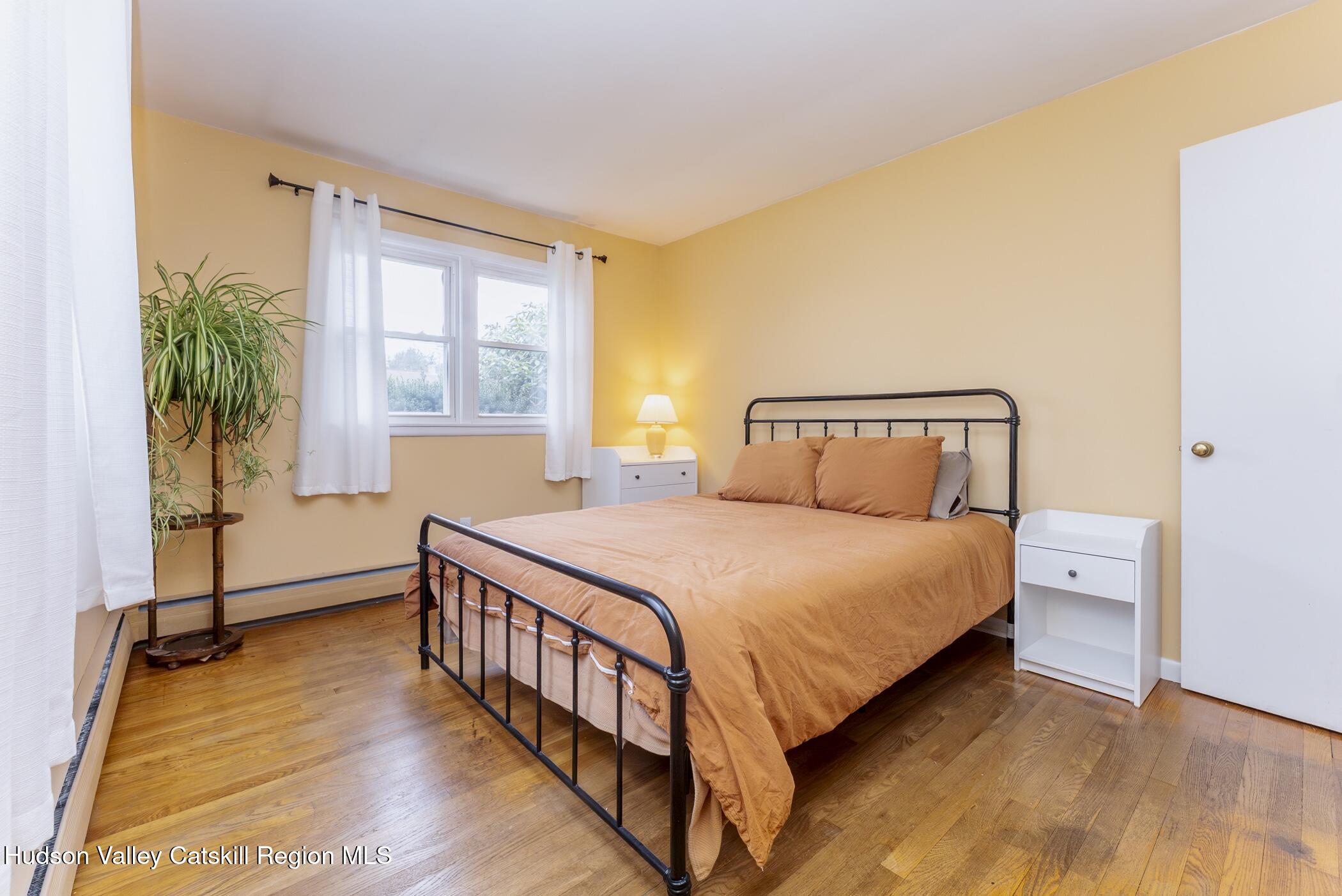 121 Rayna Street Hurley, NY 12443 - Photo 23 of 41 a bedroom with a bed and a window