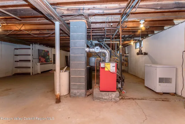 a view of a yard with plants and trees
