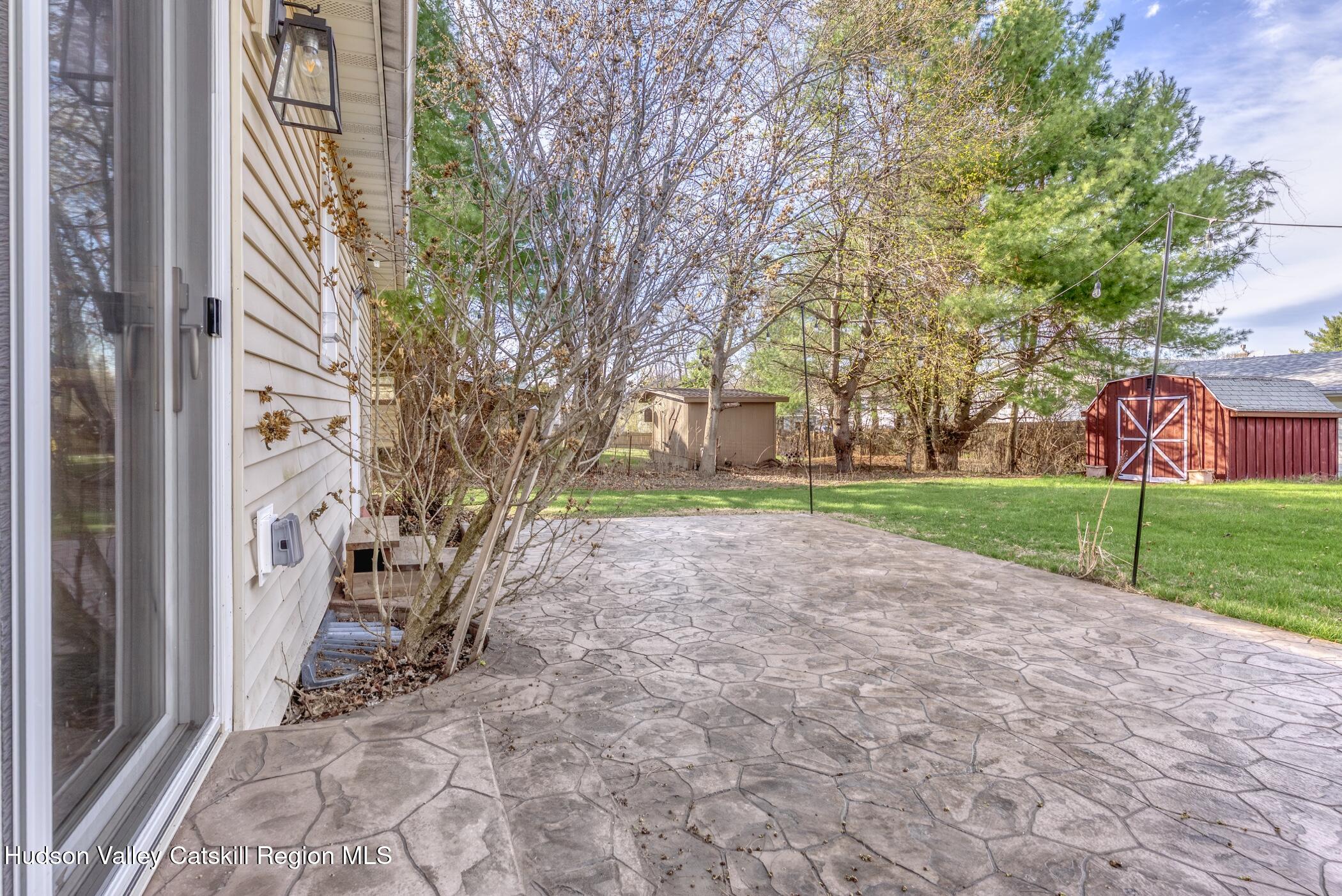 121 Rayna Street Hurley, NY 12443 - Photo 33 of 41 a view of a yard with plants and trees