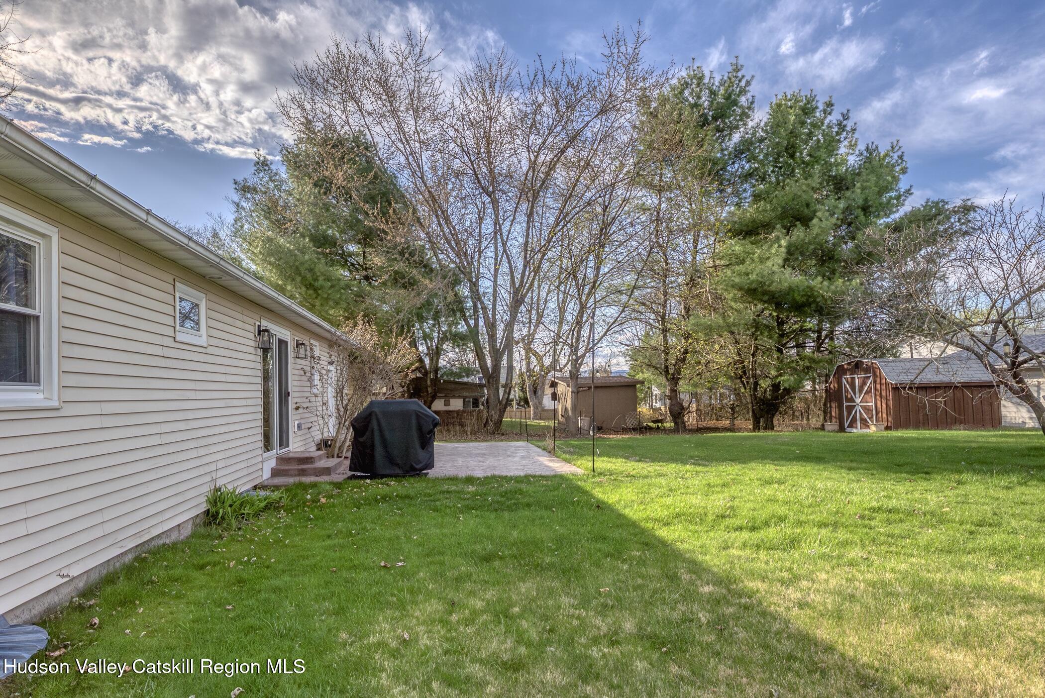 121 Rayna Street Hurley, NY 12443 - Photo 34 of 41 a view of a backyard with a garden