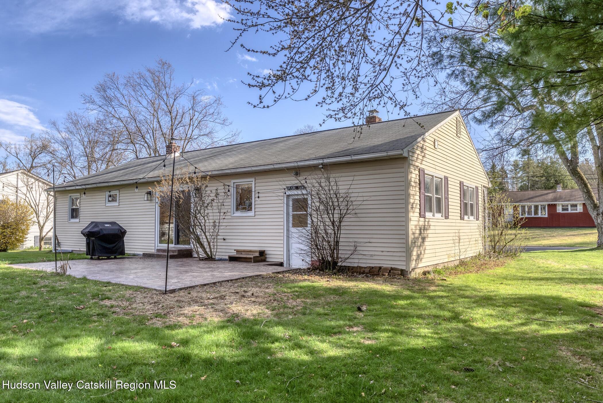121 Rayna Street Hurley, NY 12443 - Photo 35 of 41 a view of a backyard with a sitting area