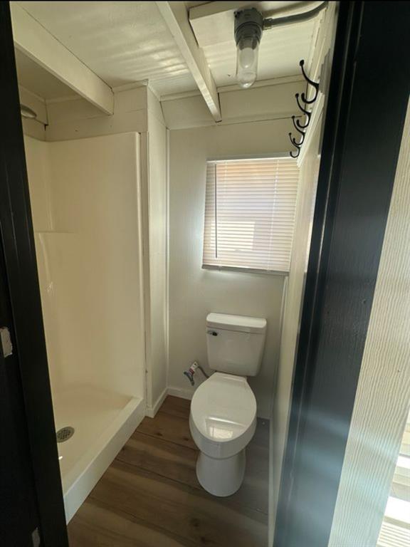 4135 Farm To Market 902 Howe, TX 75459 - Photo 5 of 8 a bathroom with a toilet and a shower