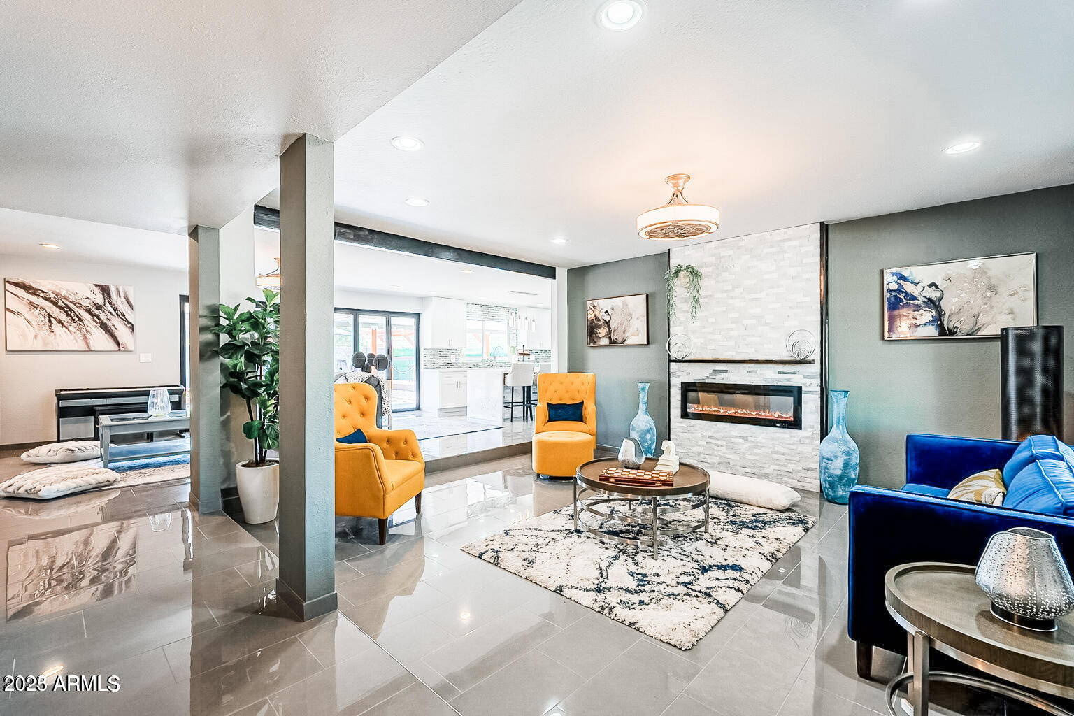11215 North 37th Avenue Phoenix, AZ 85029 - Photo 17 of 46 a living room with furniture and a wooden floor